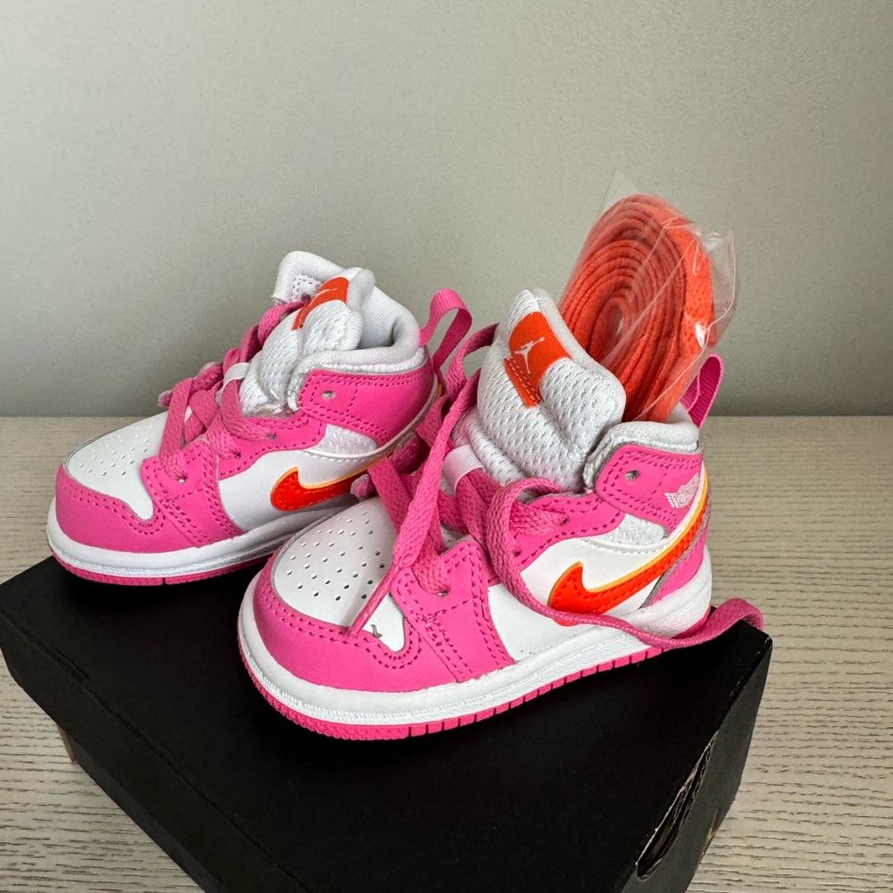 Infant Air Jordan sneakers. Size 4C. Never worn. Additional shoe laces included.